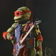 Illustration for article titled Read this: At long last, the story of how the Ninja Turtles became a rock band